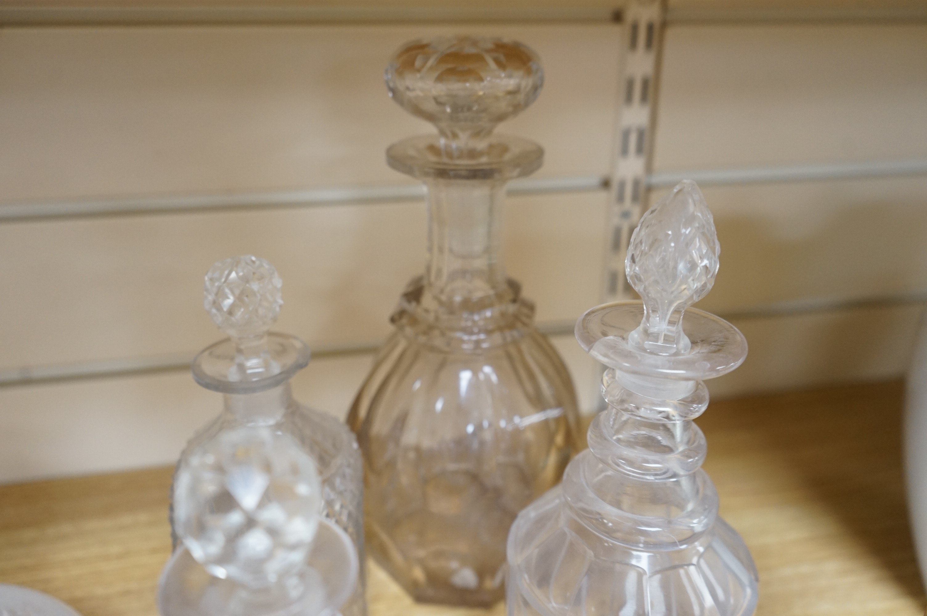 A collection of assorted drinking glassware including sets of decanters and a large etched glass goblet, largest 27cm high